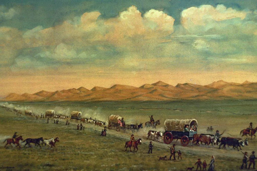 People traveling with wagons 