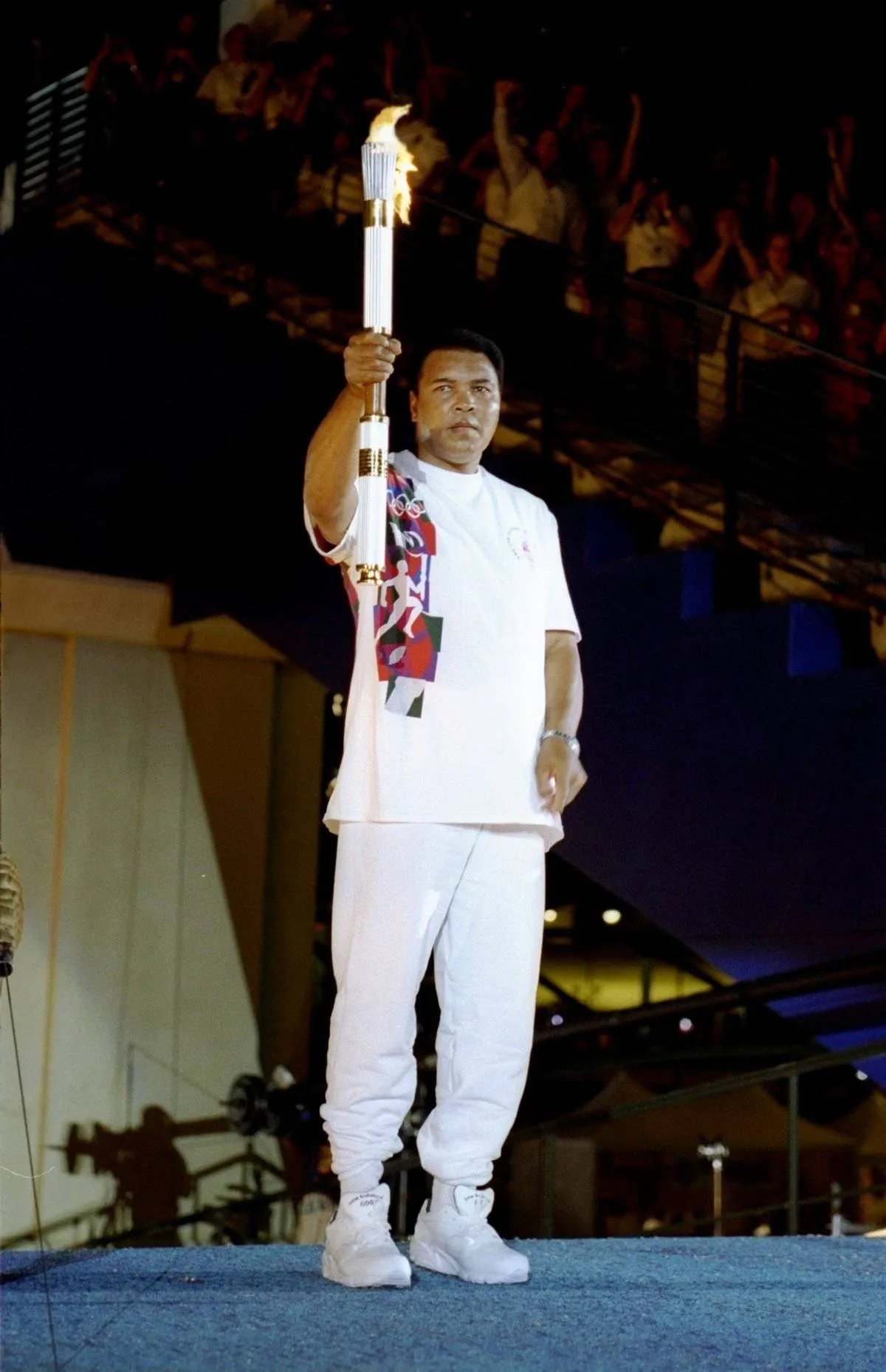 Muhammad Ali Lights The Olympic Torch In Atlanta - 1996