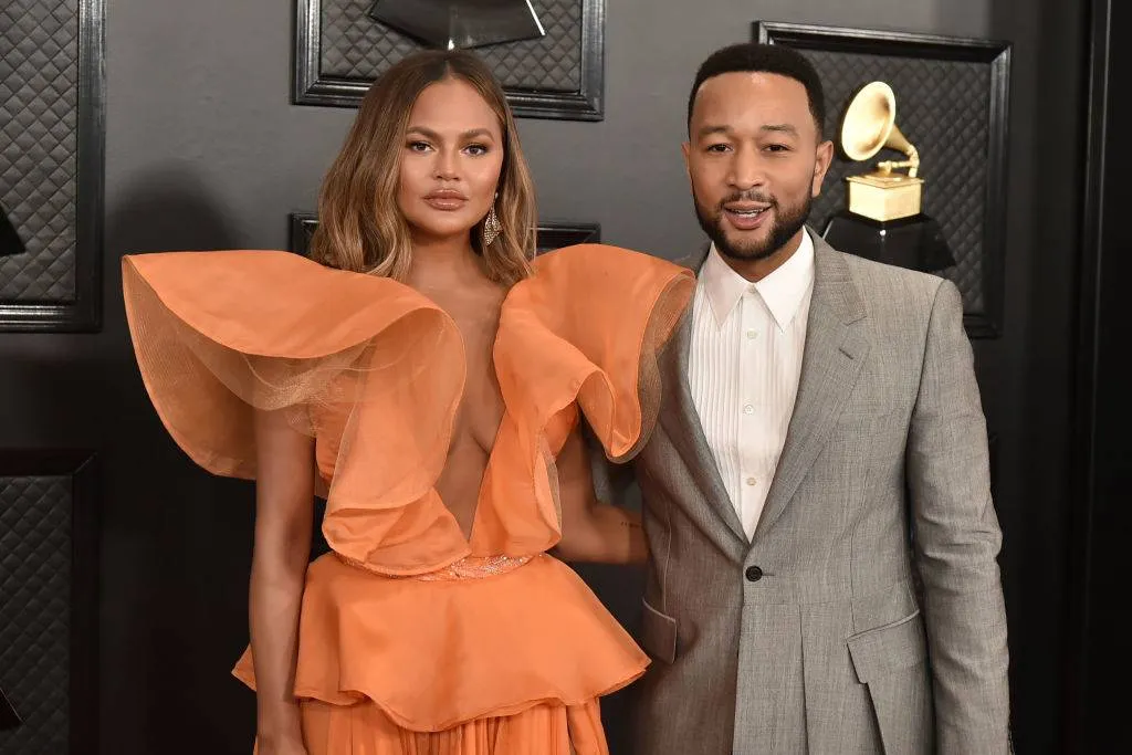 Chrissy Teigen and John Legend attend the 62nd Annual Grammy Awards