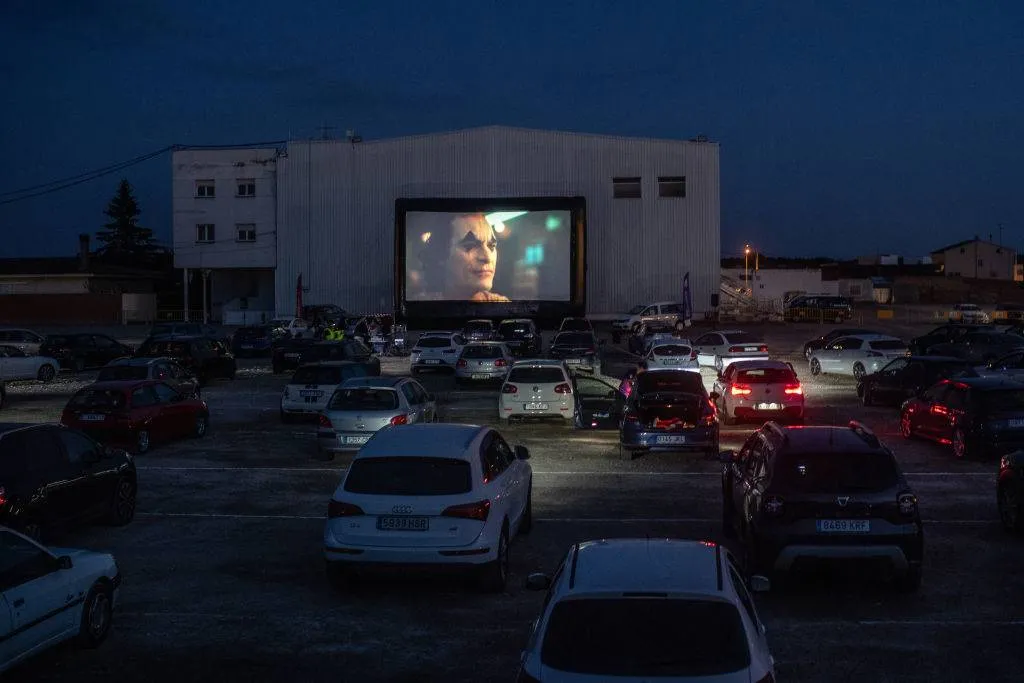 a drive-in movie theater showing Joker