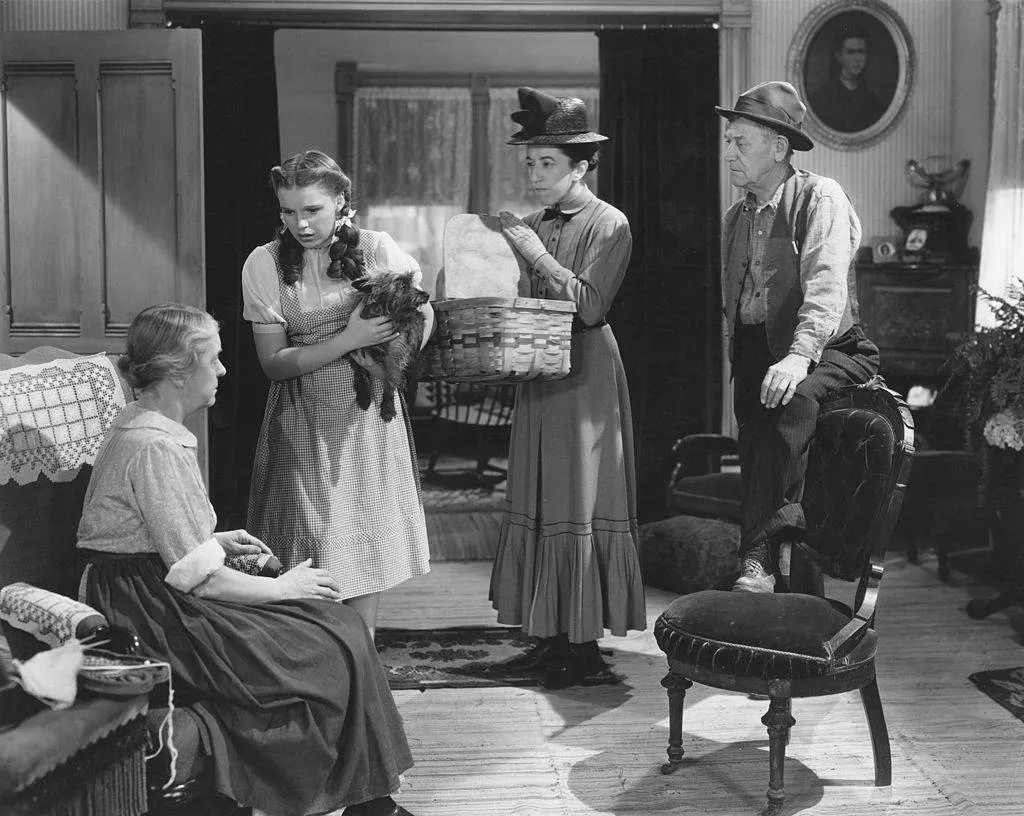 From left to right, Clara Blandick, Judy Garland, Margaret Hamilton and Charley Grapewin star in the MGM film 'The Wizard of Oz',
