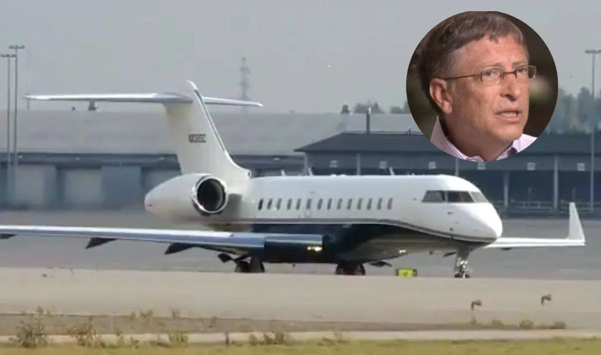 A photo of Bill Gates appears above his Bombardier private jet. 