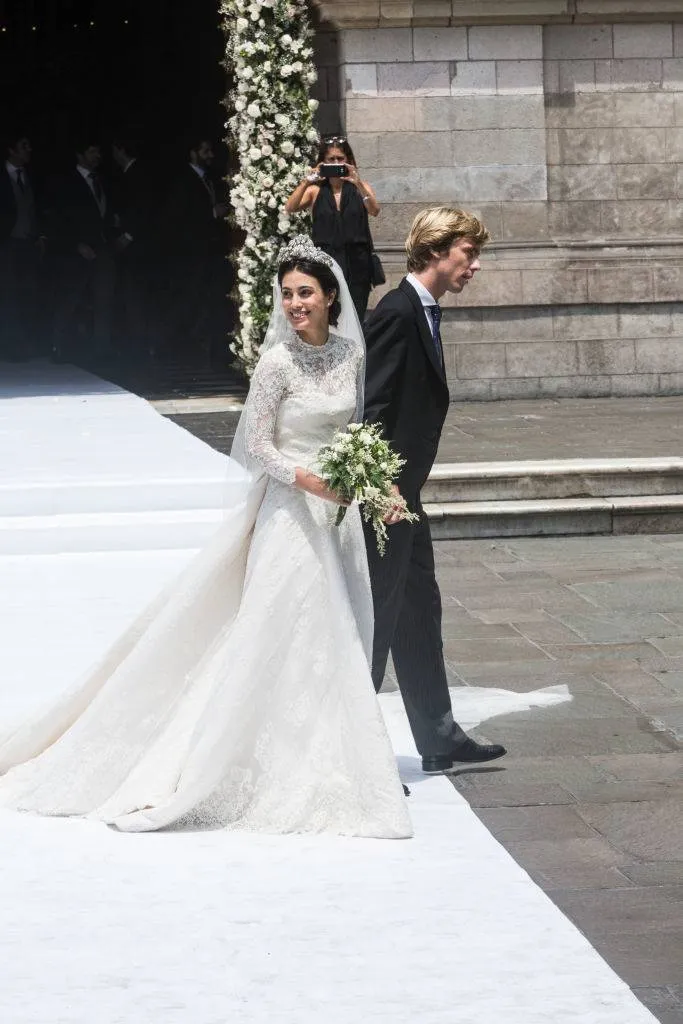 Prince Christian of Hanover (R) and Alessandra de Osma exit the church