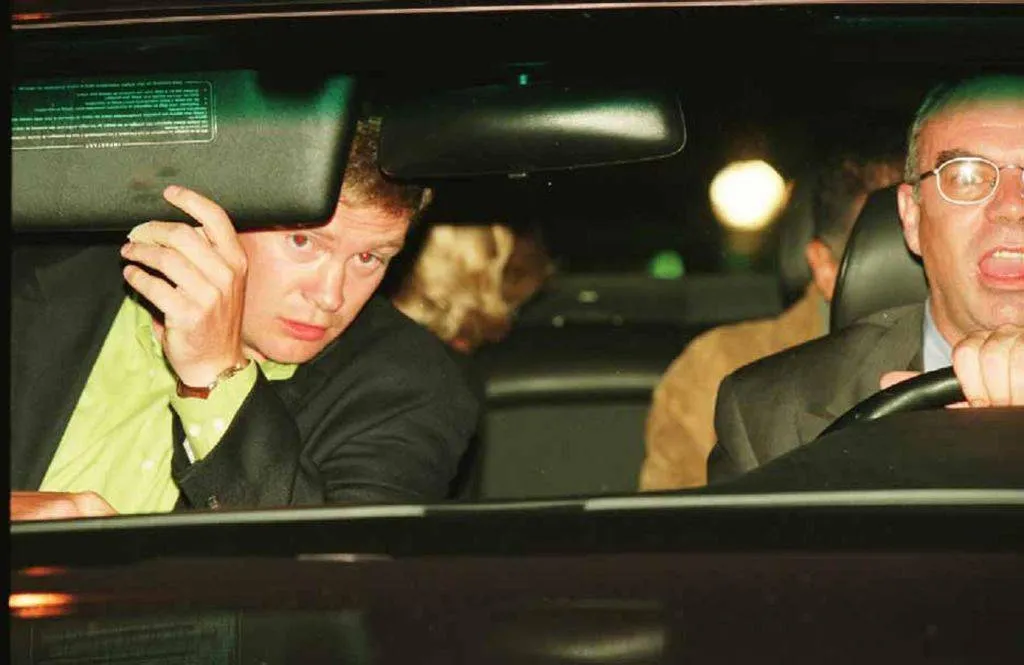 Diana, Princess of Wales and Dodi Fayed (both partially visible in back seat), bodyguard Trevor Rees-Jones (front, left) and driver Henri Paul, in their Mercedes-Benz S280