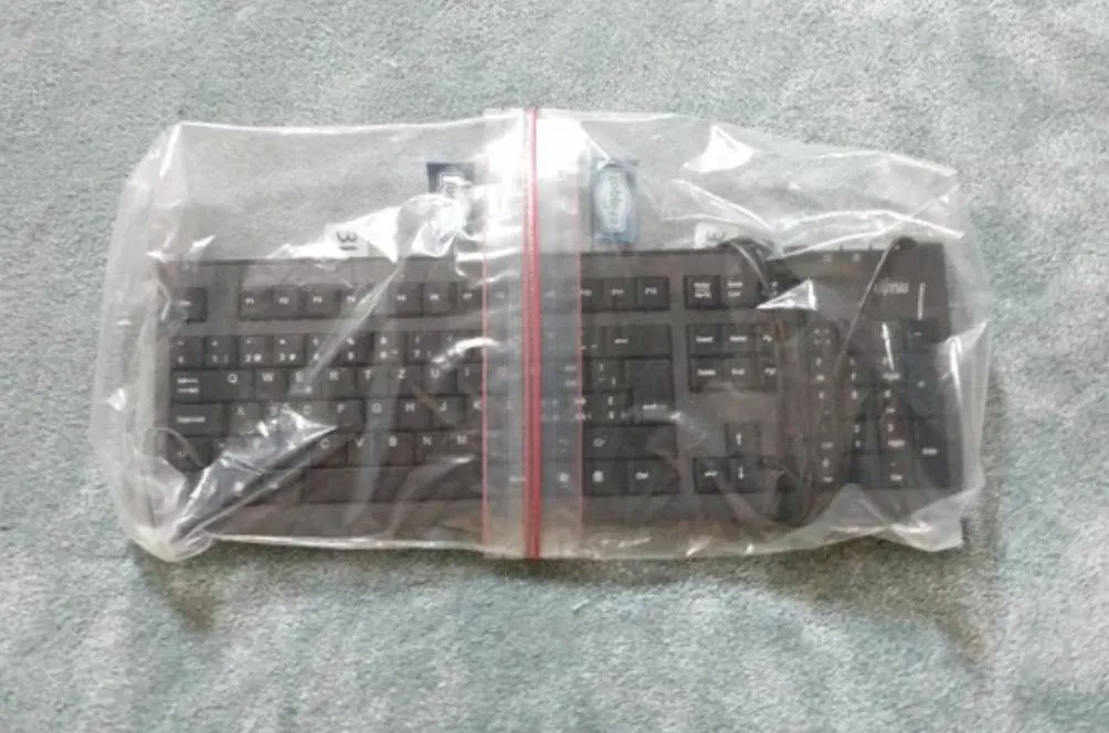 keyboard sealed up within two ziplocs
