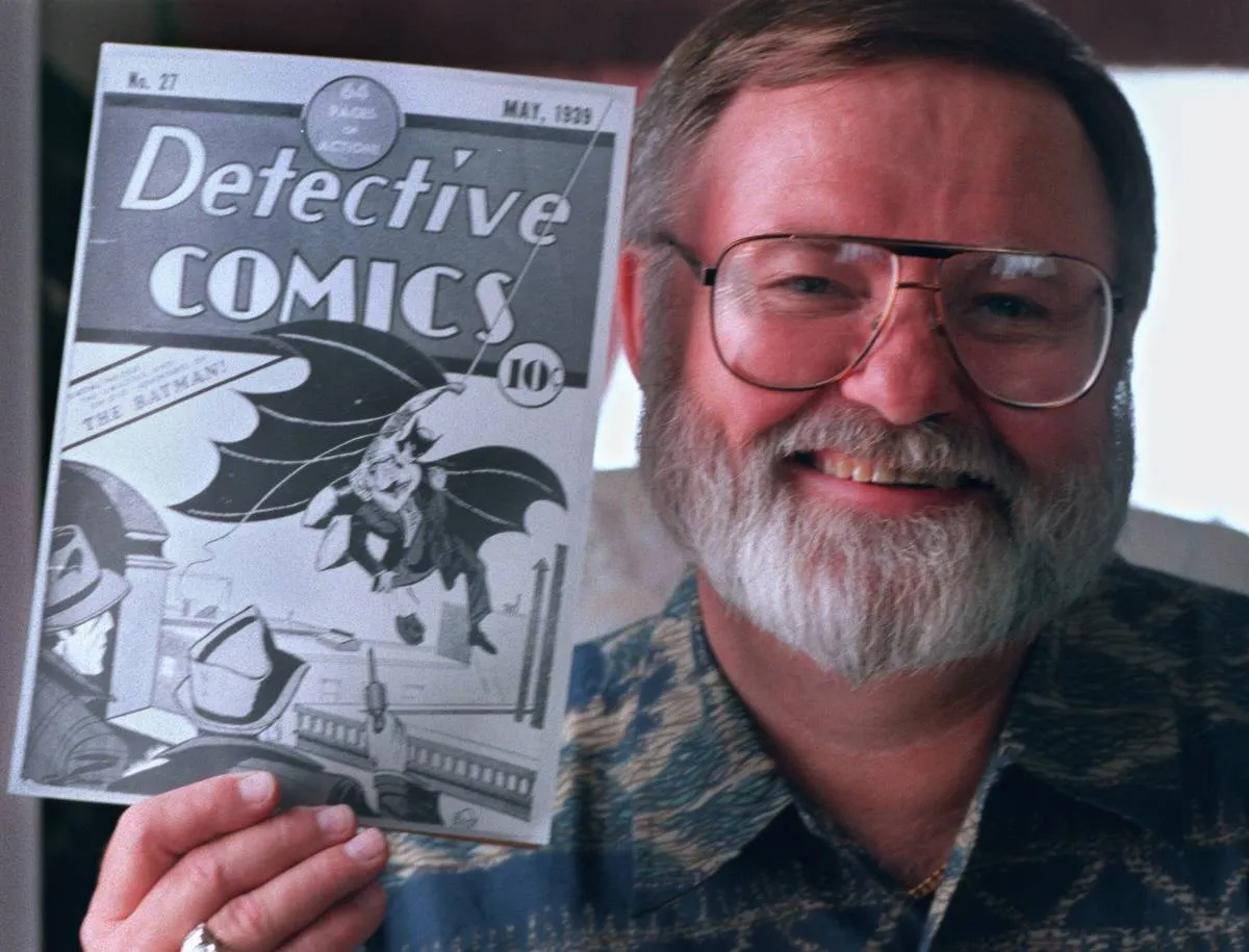 Roy Grubb of Apple Valley holds a photocopy of the cover of the first Batman Comic Book that recently sold at auction for $60,000. Grubb purchased the comic, published in 1939 for $27,000