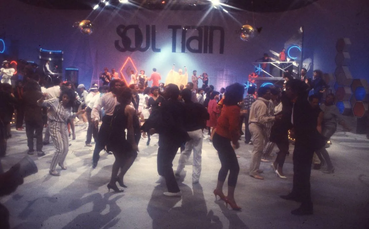 Wide shot of the Soul Train Dancers on the dance floor.