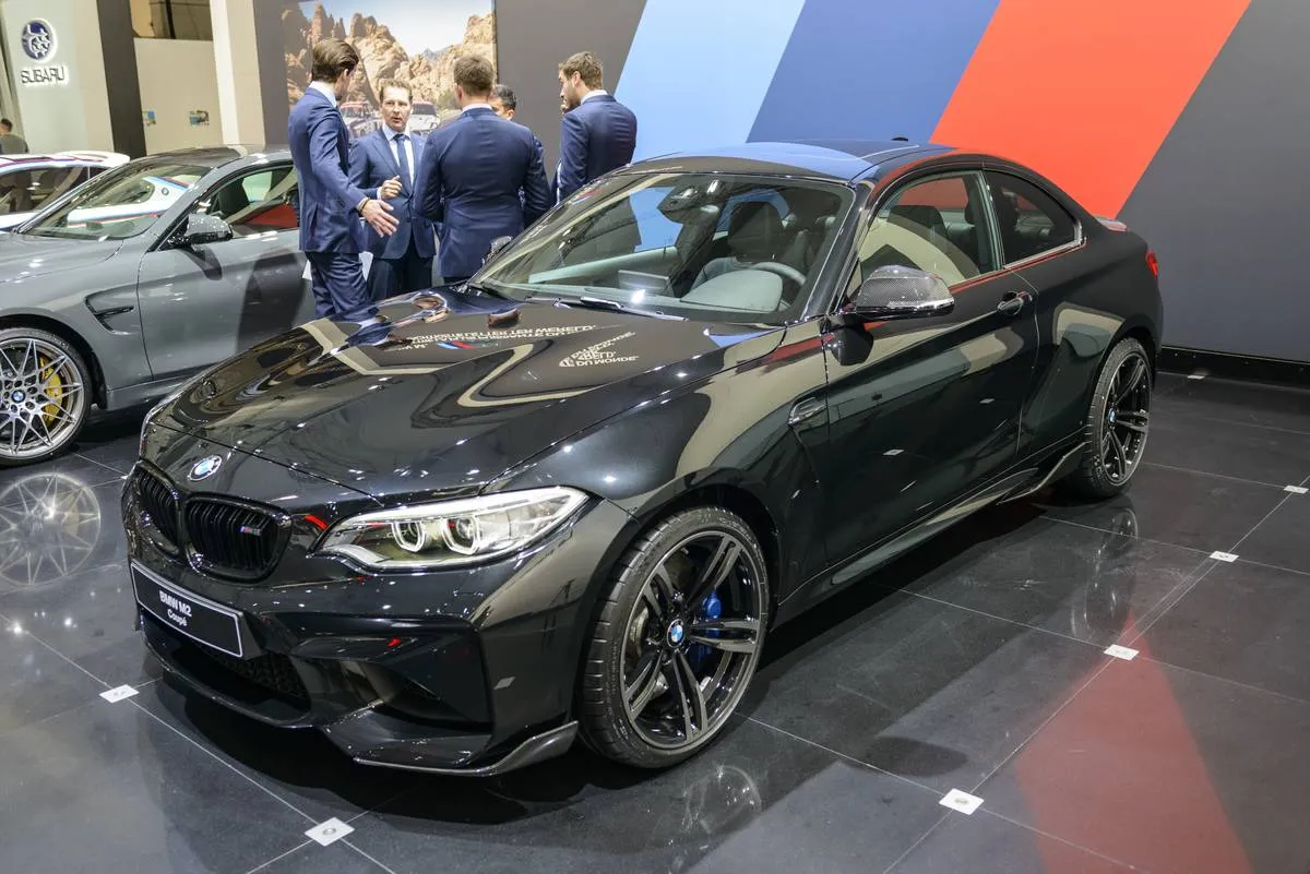 A black 2-Series BMW is for sale.
