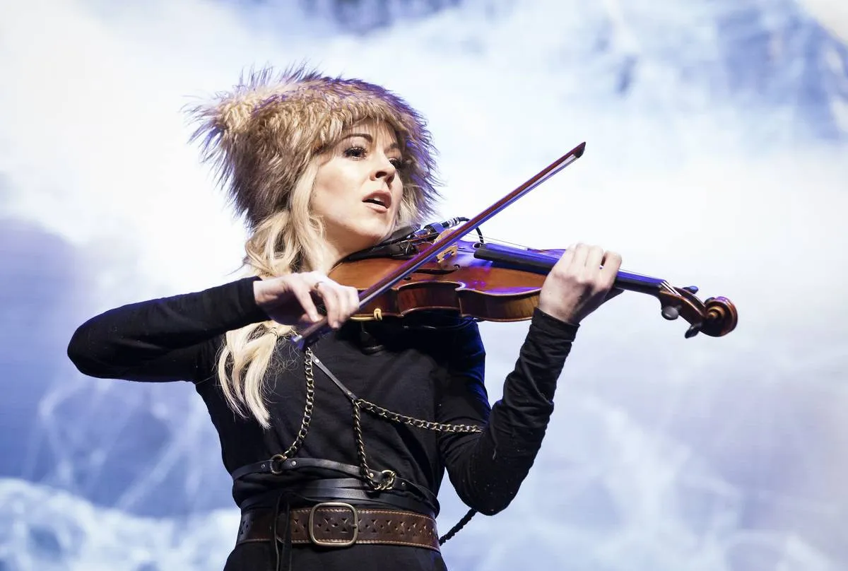 Lindsey Stirling performs and plays violin at the Powerful-U Experience LA 2019.