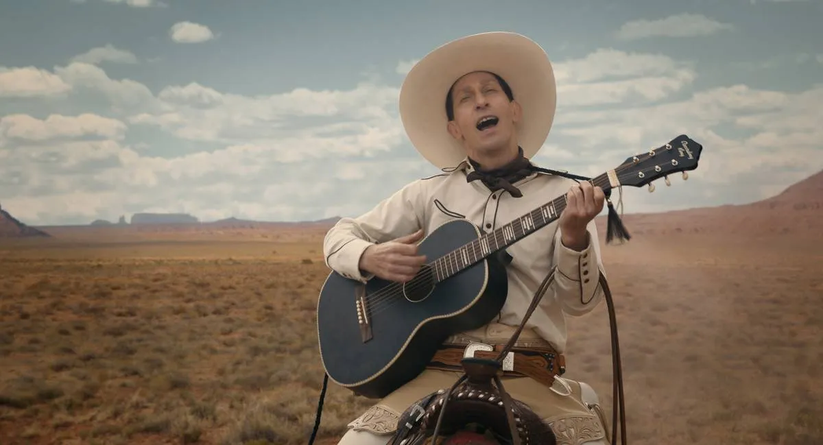 Nelson as Buster Scruggs 