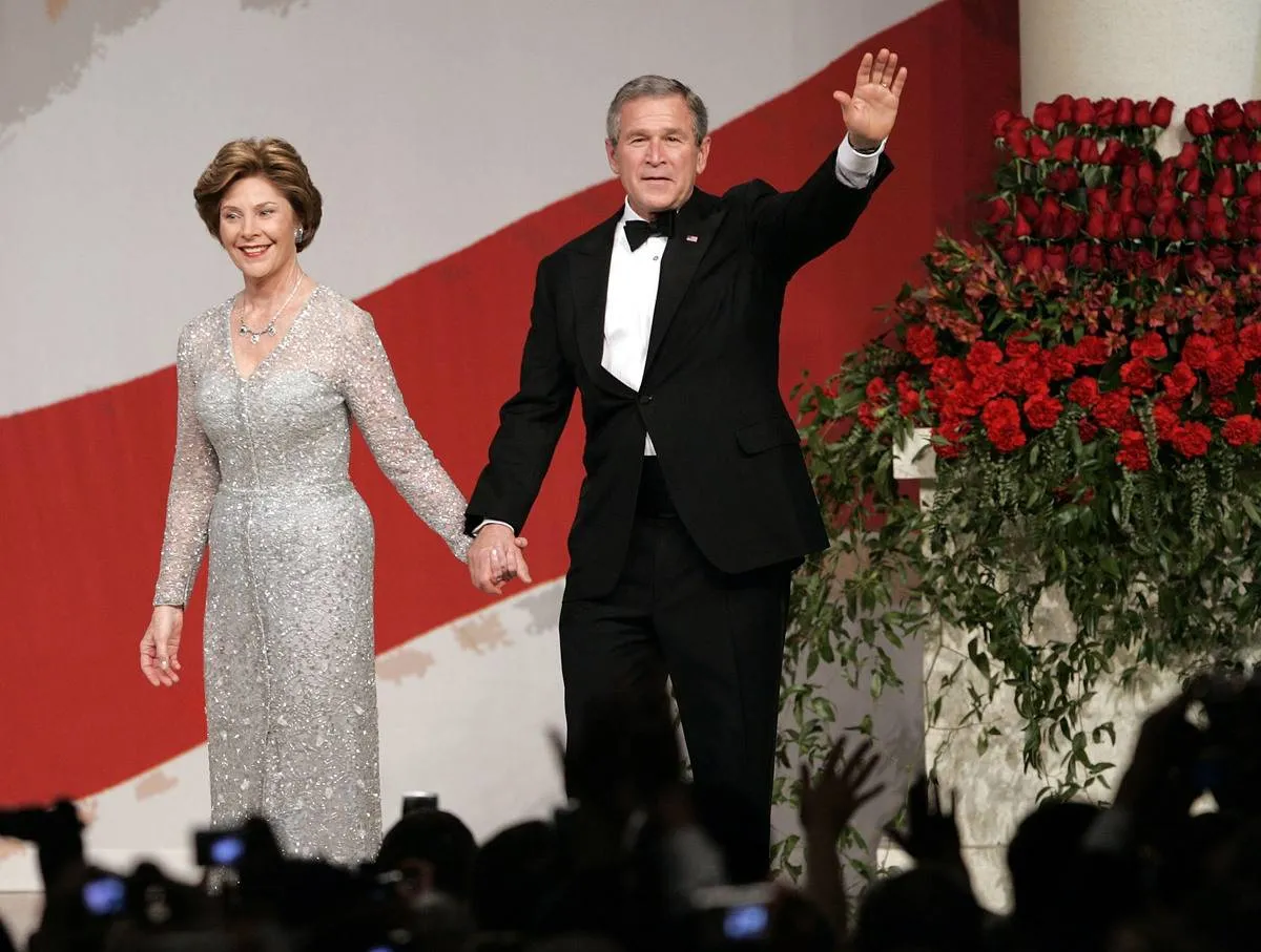 George and Laura Bush wave at the crowd during the 2005 inauguration.