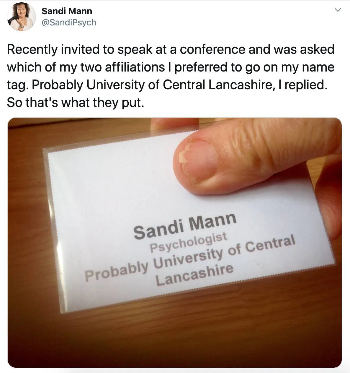 woman answered Probably University of Central Lancashire and someone put that on her tag 