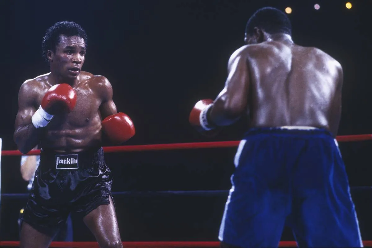 Sugar Ray Leonard moves in to punch against his opponent