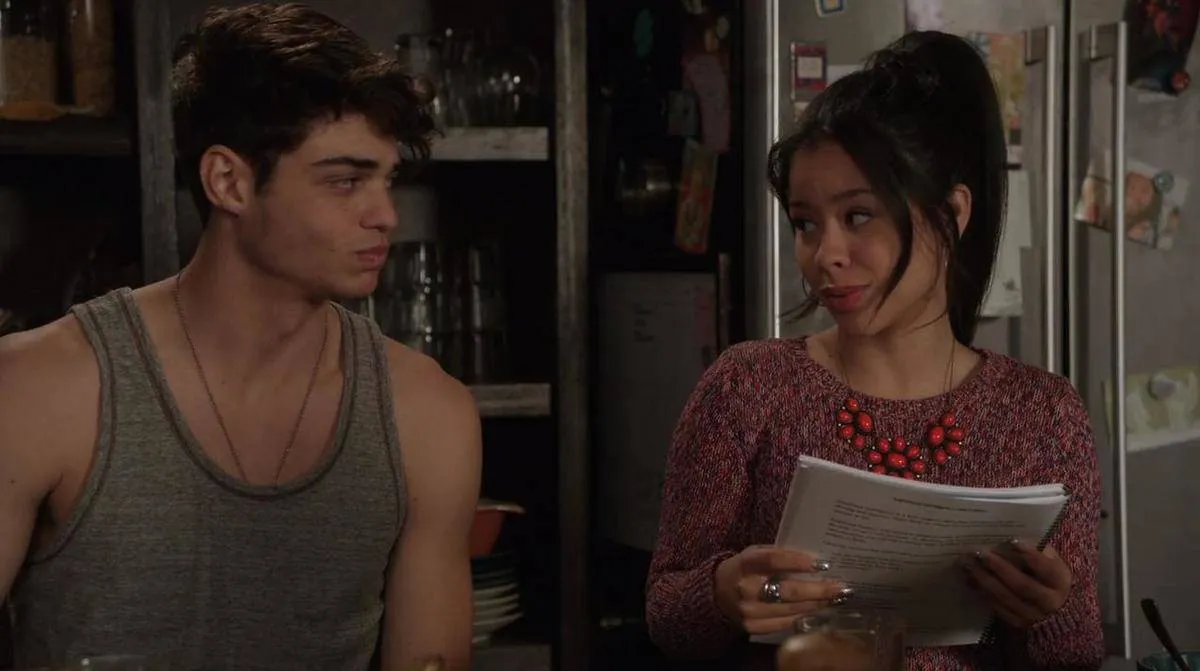 a boy and girl looking at each other on the fosters
