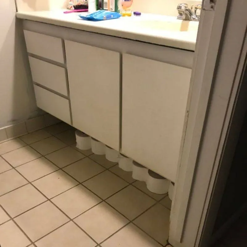 parents asked kid to put the toilet paper under the sink