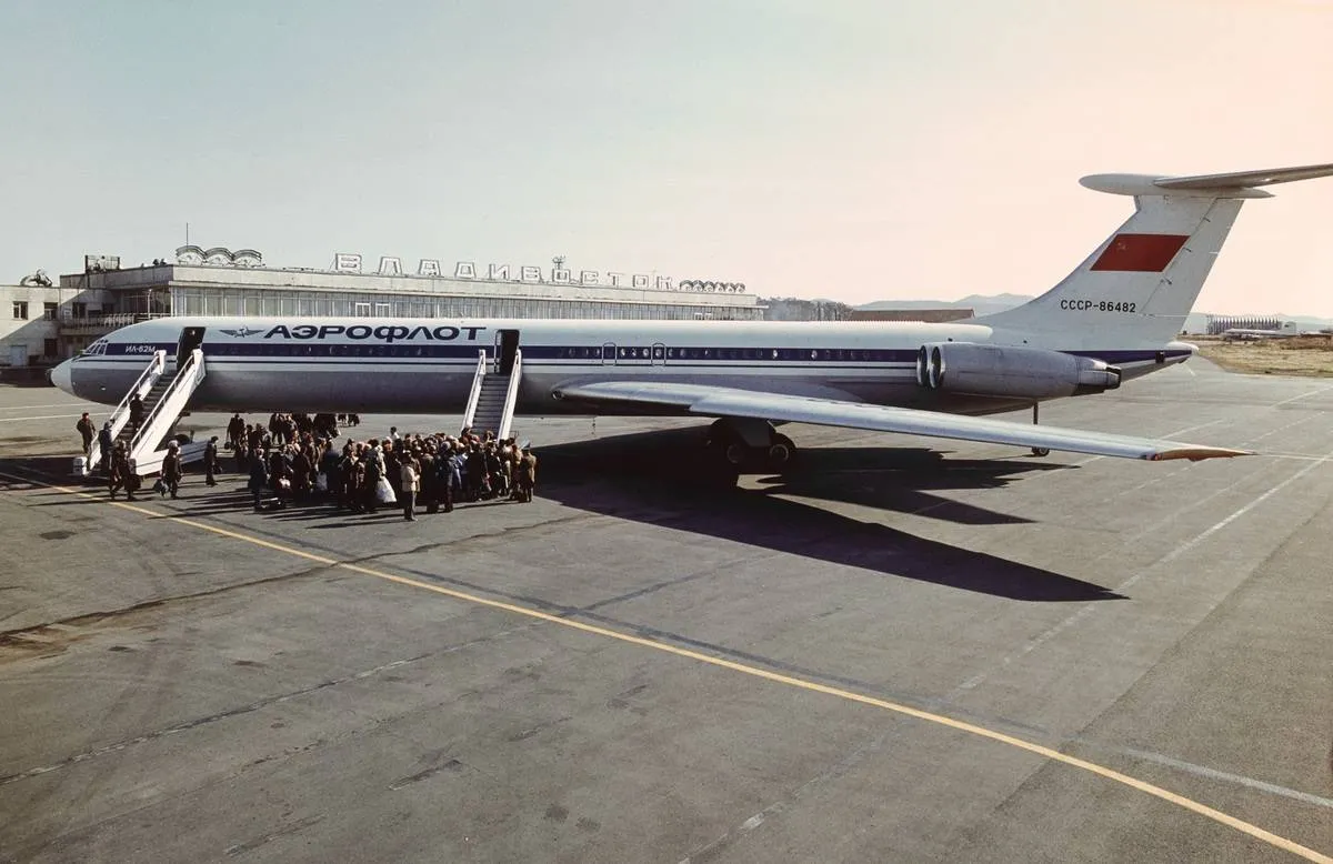 Passengers board a Ilyushin Il-62.