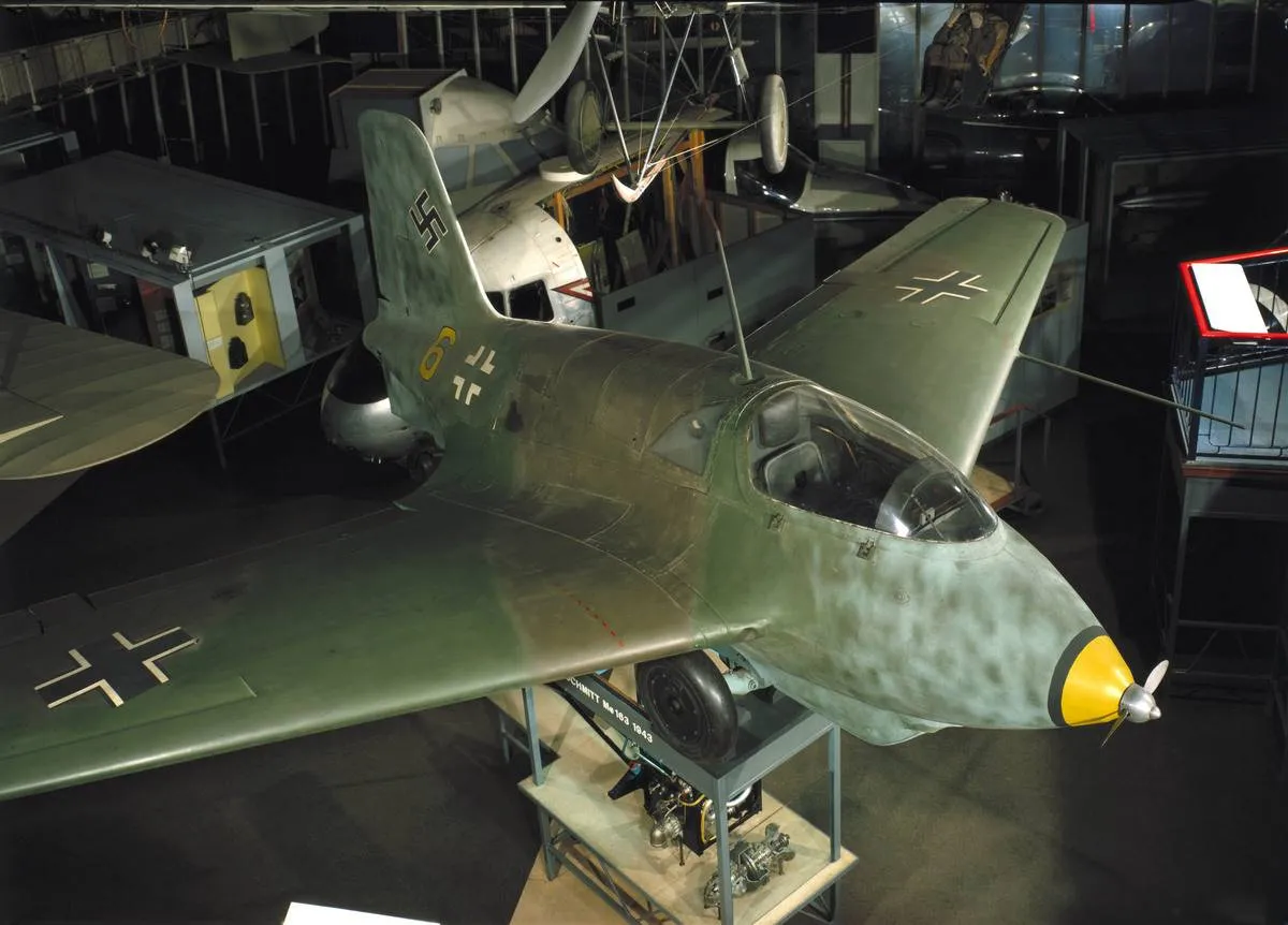 The Messerschmitt Me 163 Komet is on display at a museum.