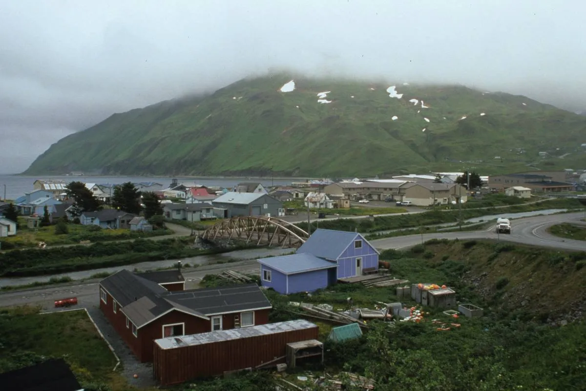 A photo shows a view of Unalaska, Alaska.