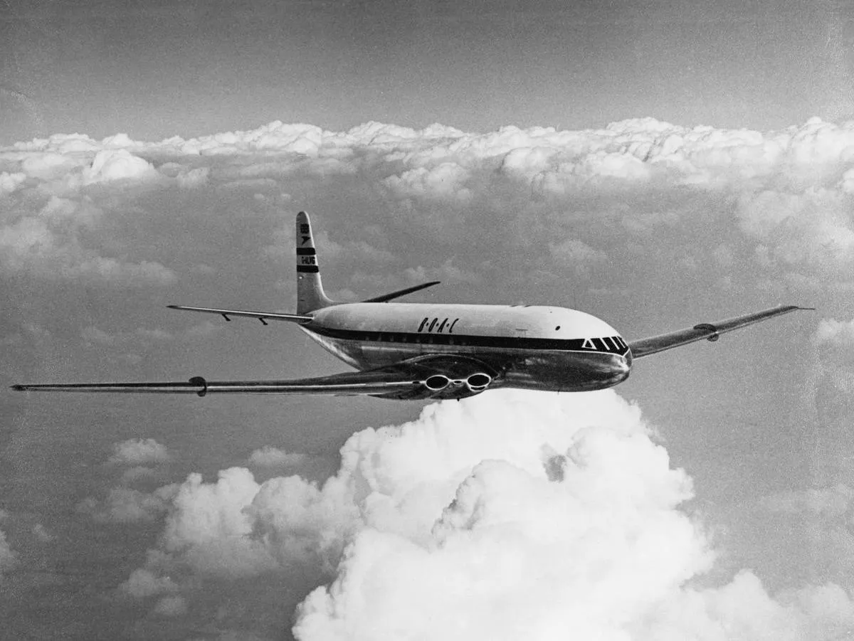 The de Havilland Comet flies through the sky.