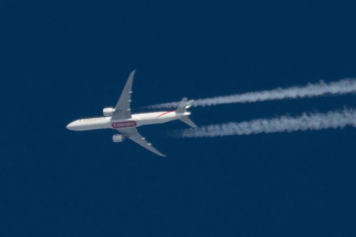 Emirates Boeing 777 Flying Over The Netherlands