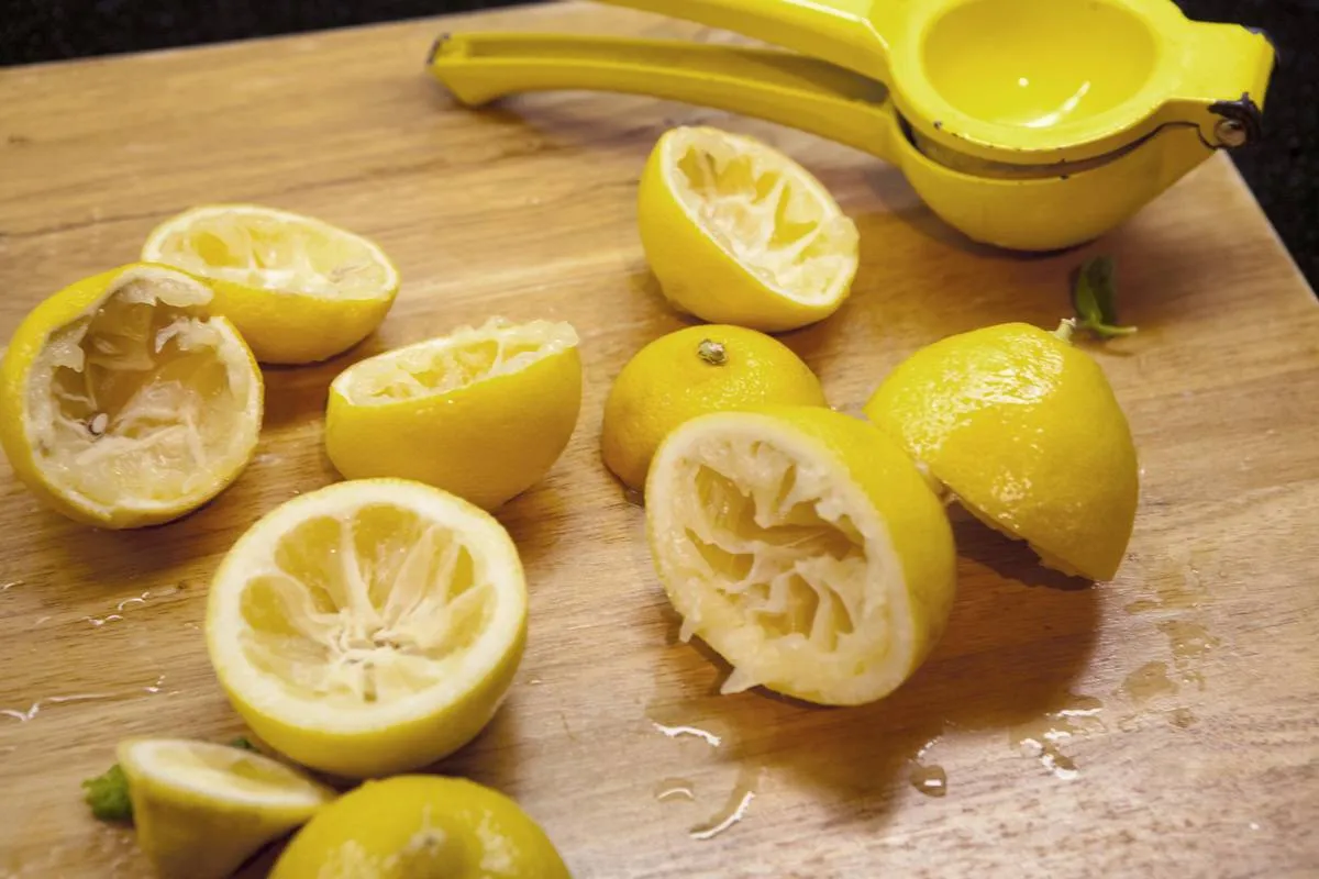 Fresh Squeezed Lemons on Cutting Board