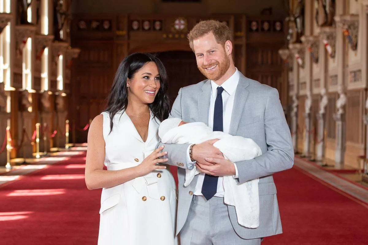 Prince Harry and Meghan Markle introduce their newborn son Archie to the public.