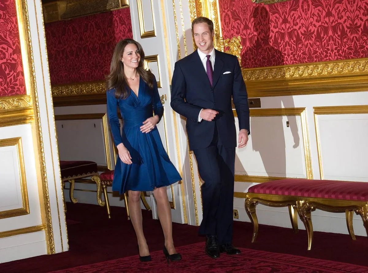 Prince William and Kate Middleton arrive to announce their engagement to the press.