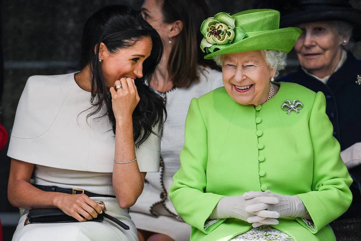 June 2018: Meghan Is Snapped Giggling With The Queen