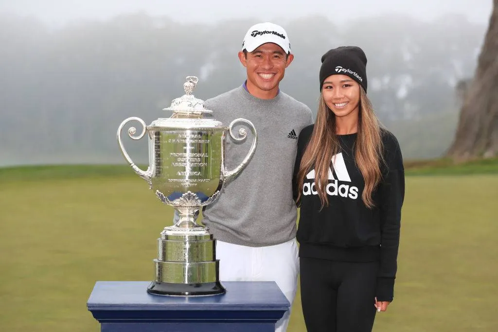 Collin Morikawa of the United States celebrates with the Wanamaker Trophy and girlfriend Katherine Zhu after winning the 2020 PGA Championship