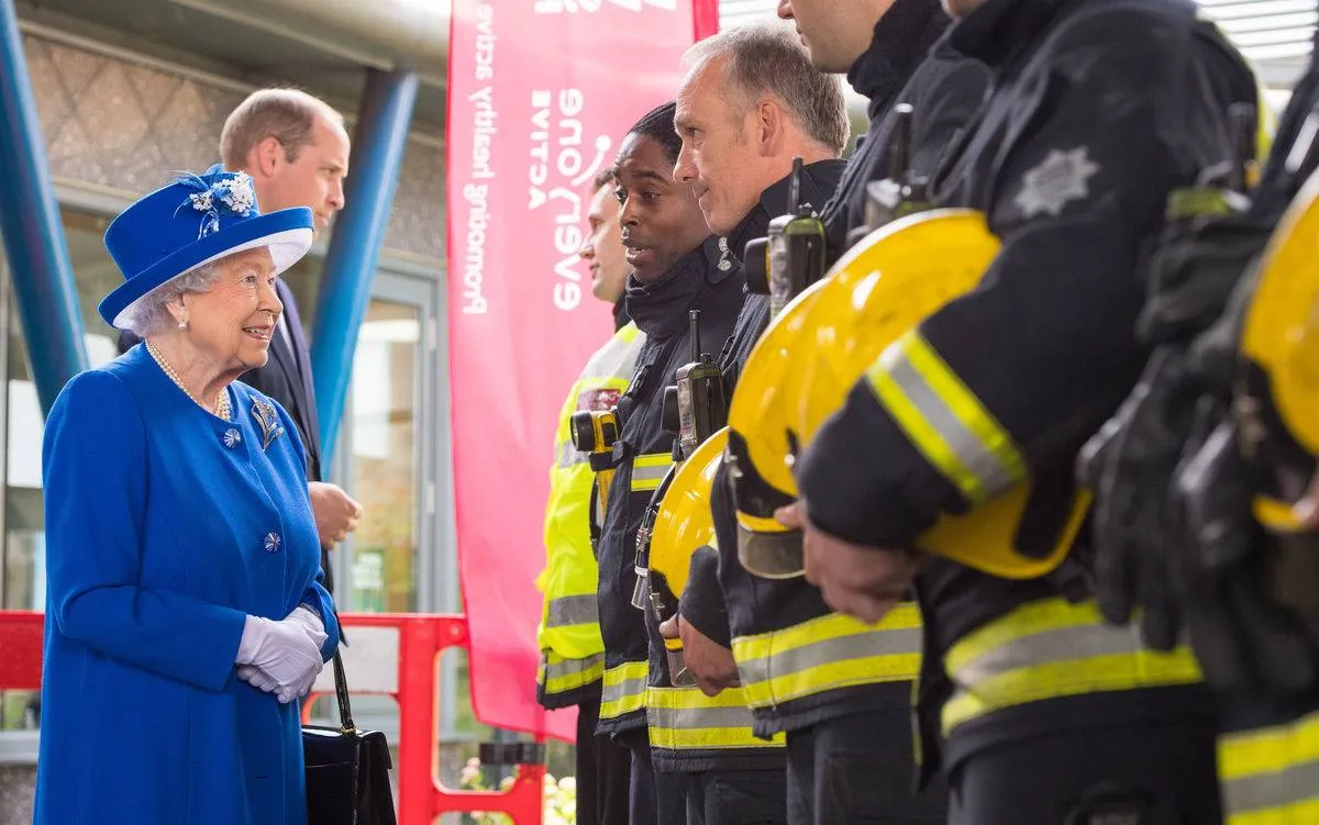 The Queen Visits Scene Of Grenfell Tower Fire