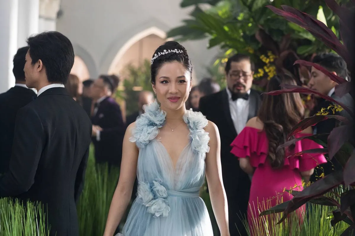 Constance Wu in a blue dress in crazy rich asians