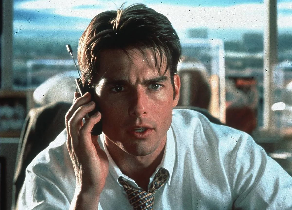 Tom Cruise talking on an old cell phone in jerry maguire