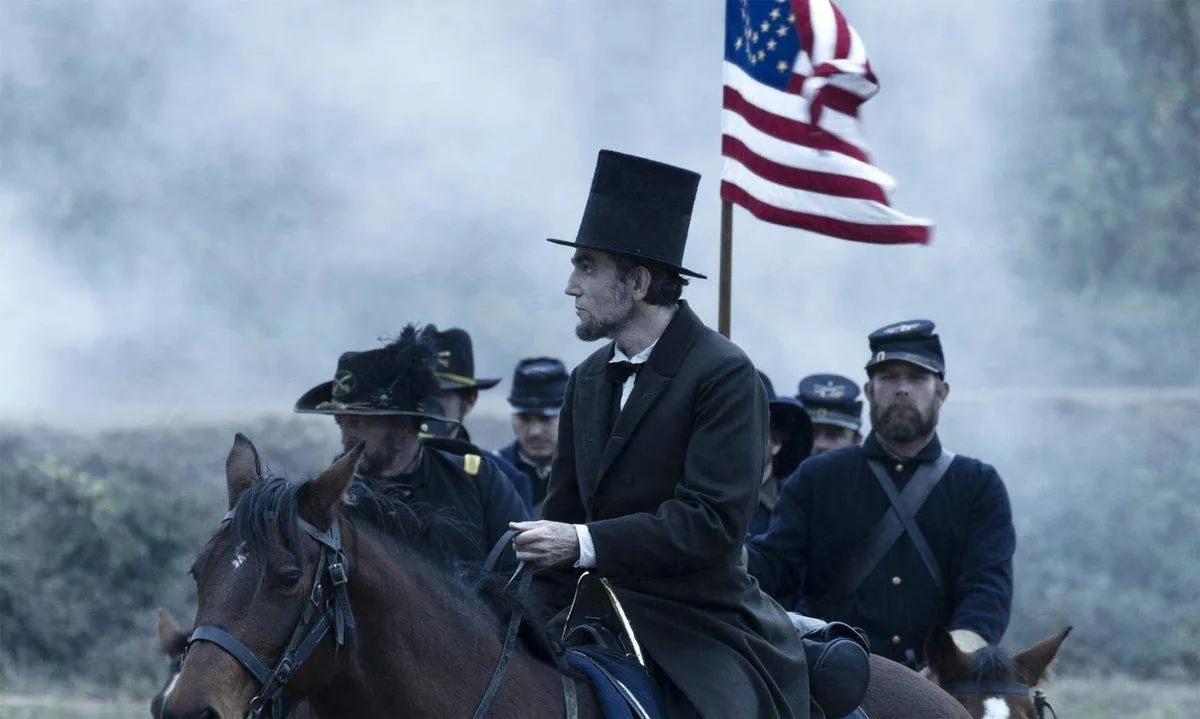 Daniel Day-Lewis as Abraham Lincoln riding a horse during the Civil War