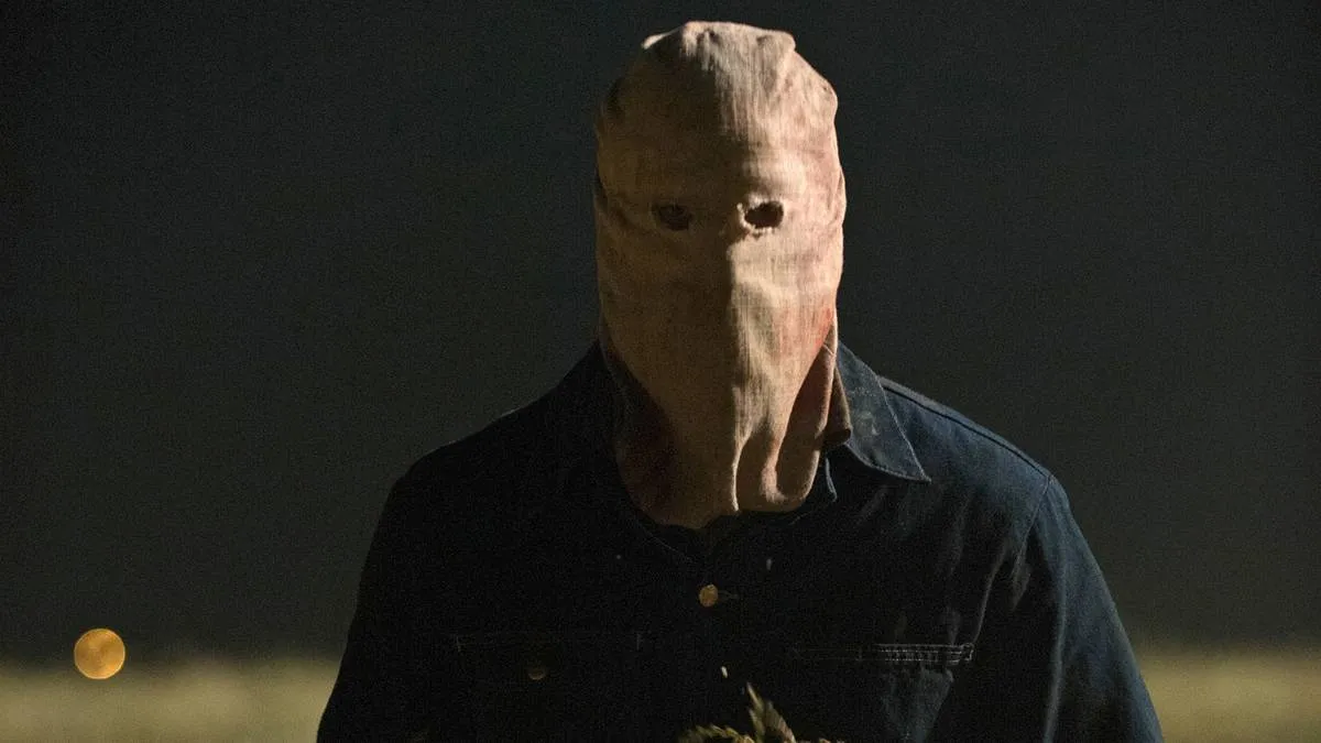 a man wearing a mask in the town that dreaded sundown