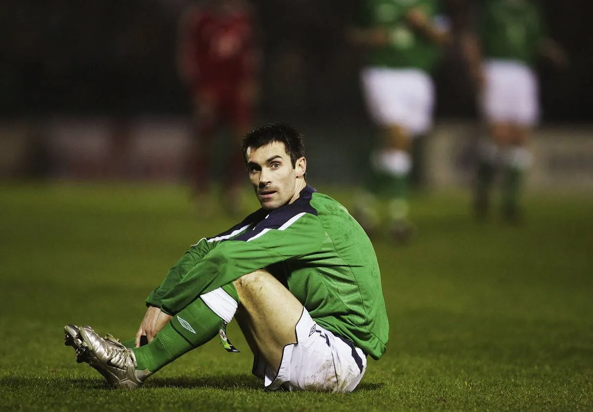 Keith Gillespie of Northern Ireland sits on the pitch after a missed opportunity during the International Challenge match between Northern Ireland and Canada at Windsor Park on February 9, 2005 in Belfast, Northern Ireland