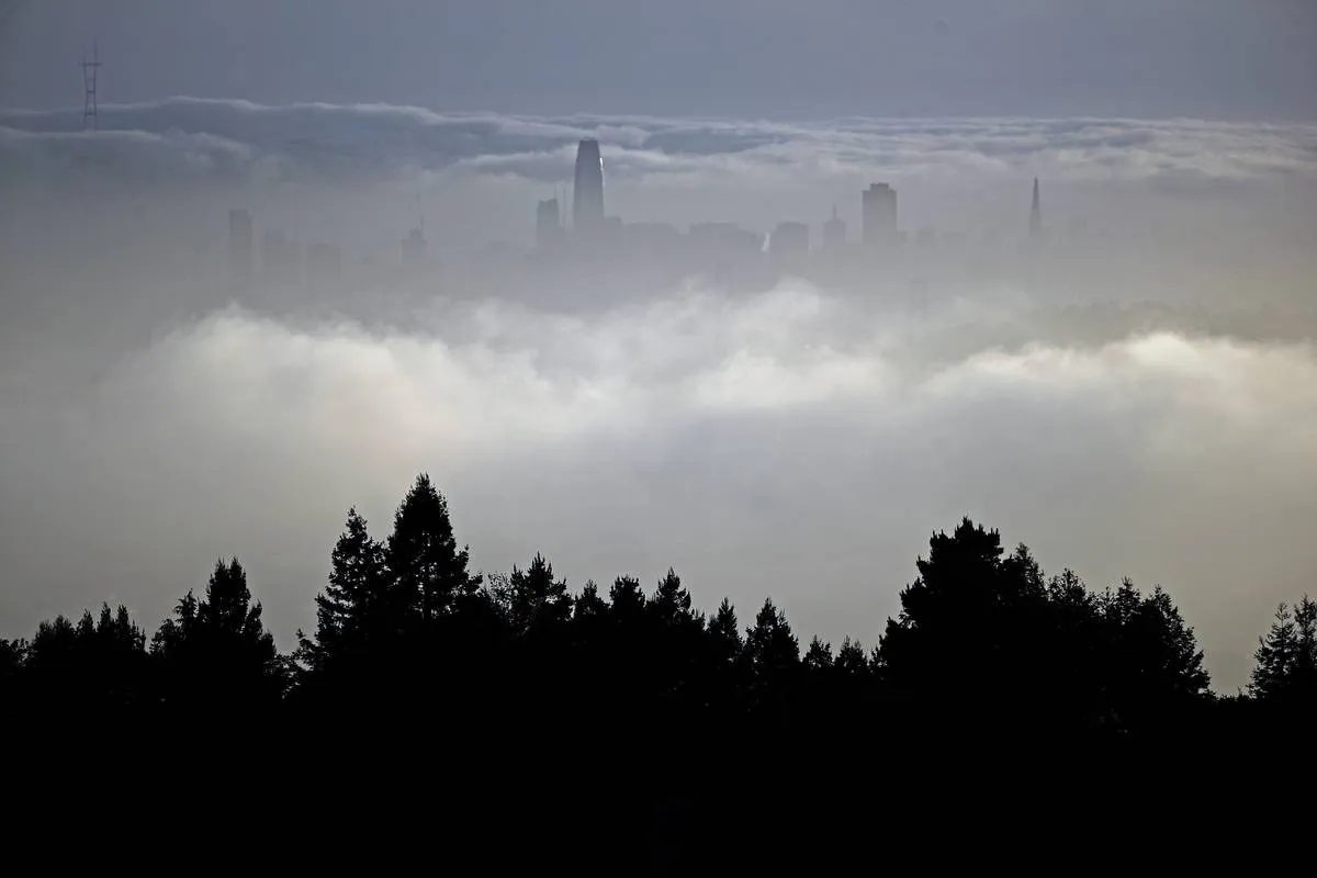 A change in the weather is on it's way with fog rolling in to obscure the San Francisco skyline as seen from the hills in Oakland Calif. on Mon. April 23, 2018.