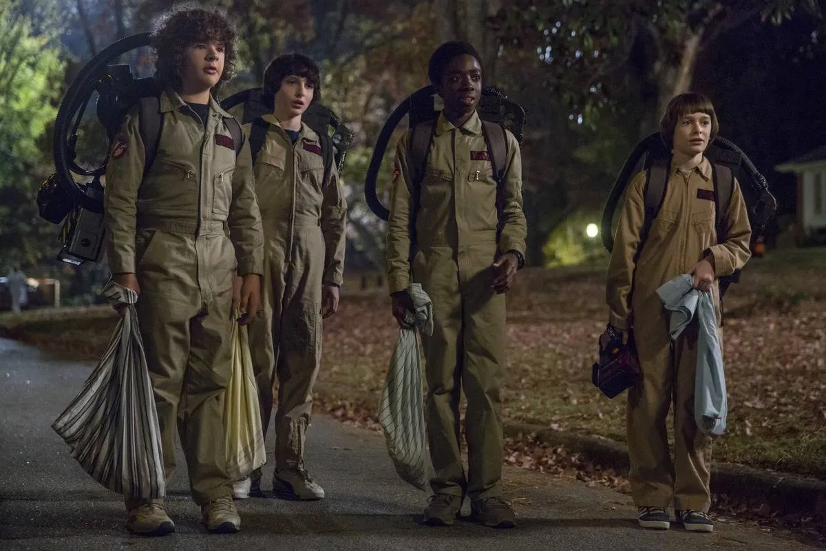 boys from stranger things dressed as ghostbusters