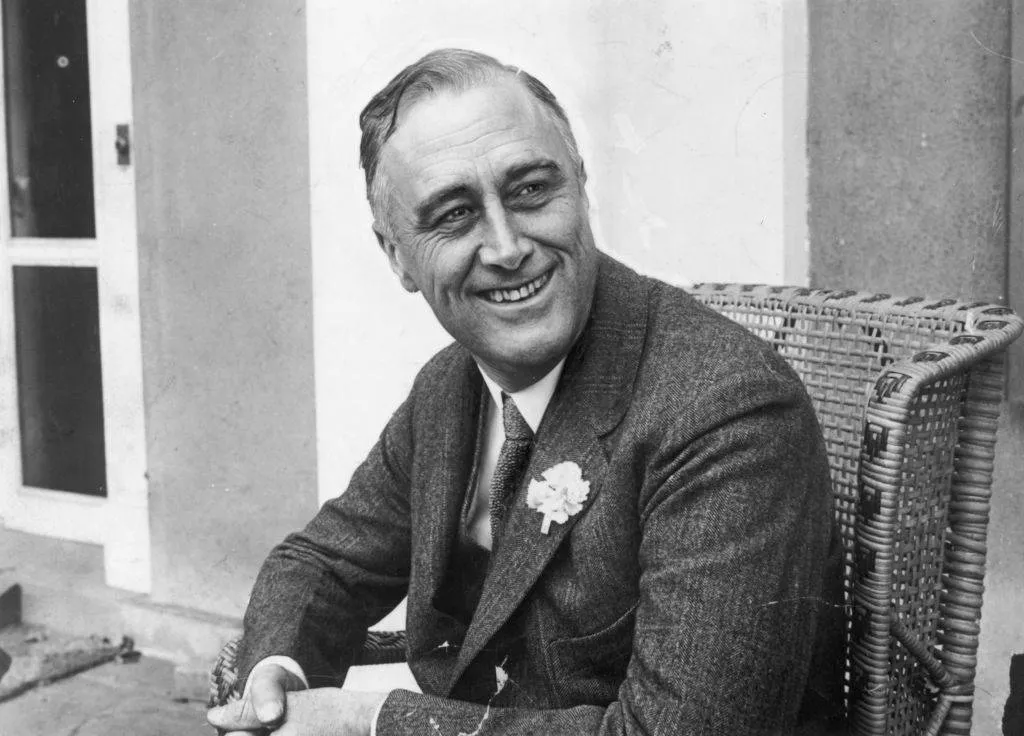 fdr smiling in black and white photo
