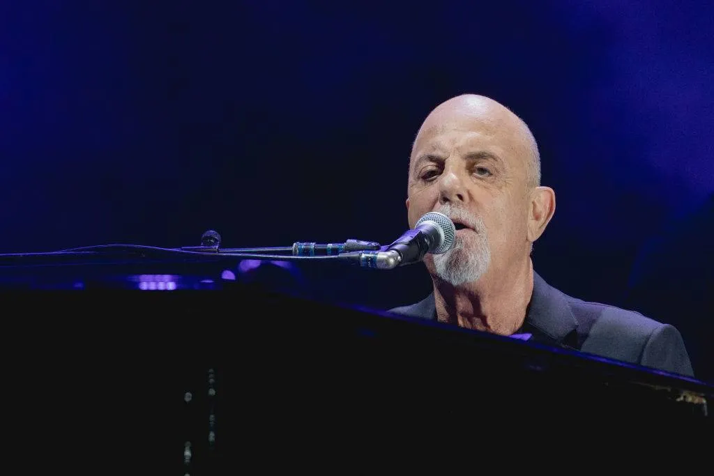 Billy Joel performing on the piano