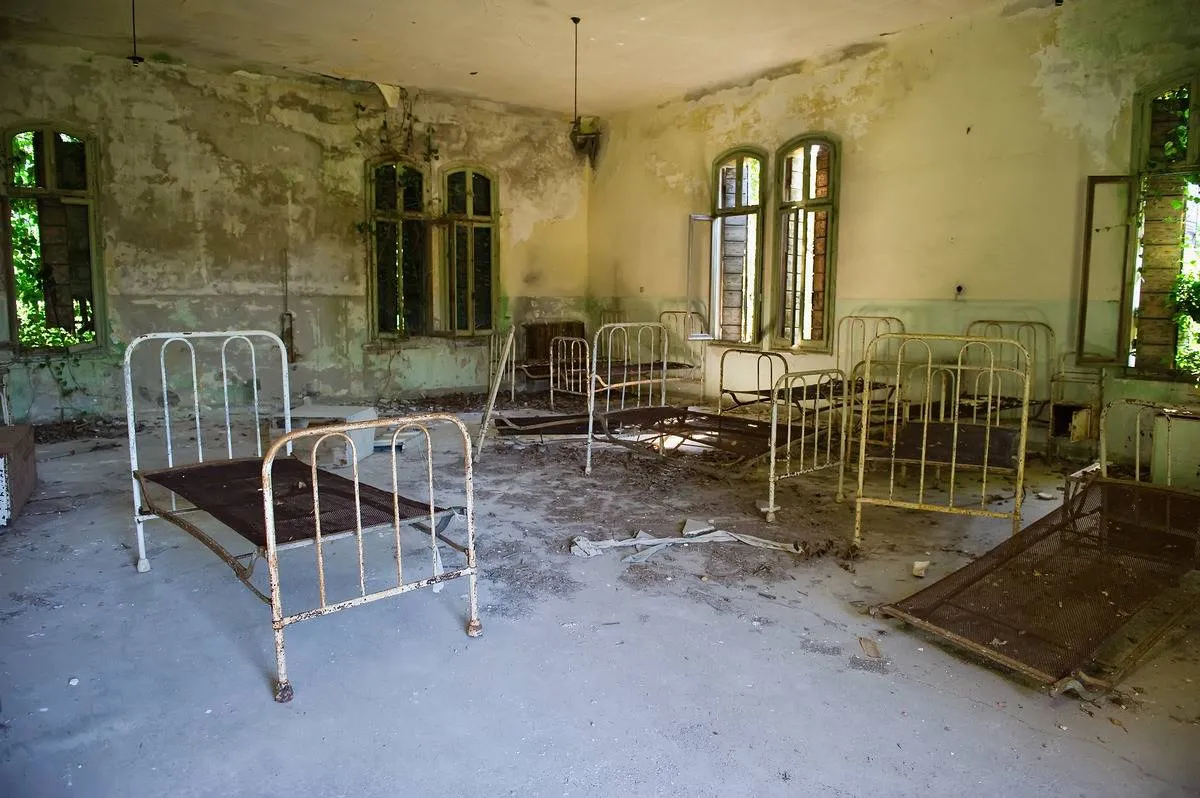 Beds and furniture remain in one of the dormitories in the psychiatric ward of the abandoned Hospital of Poveglia on August 27, 2011 in Venice, Italy. The island of Poveglia, with its ruined hospital and plague burial grounds, is said to be the most haunted location in the world.