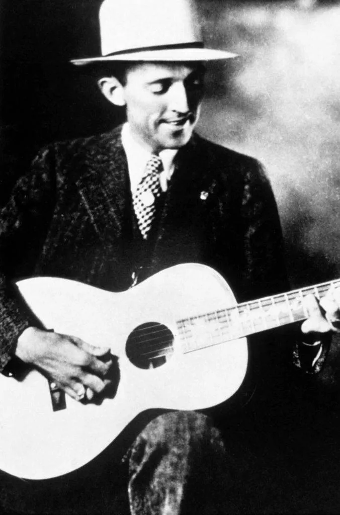 jimmie rodgers playing guitar
