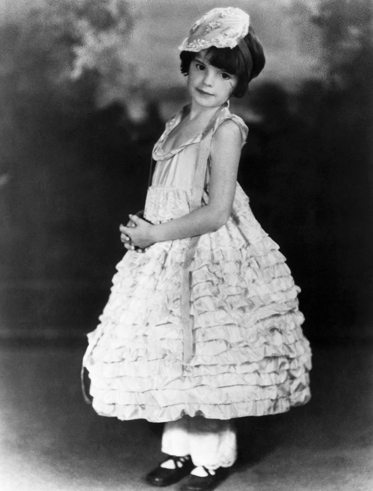 Judy Garland costumed in ruffles for her first major role in the Kiddie Revue in Los Angeles at the age of five.