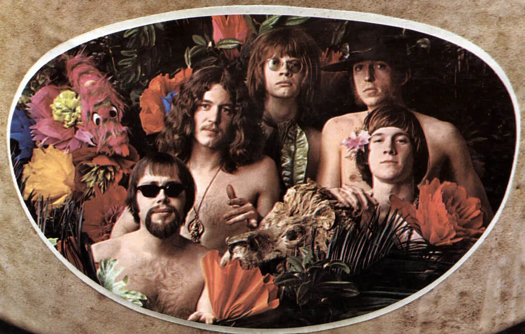 Artistic promotional image of the band Lemon Pipers shirtless and surrounded by florals