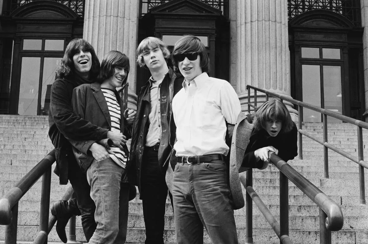 American rock group the Blues Magoos on the steps of the New York Post Office in New York City, circa 1966. From left to right, they are bassist Ron Gilbert, guitarist Mike Esposito, drummer Geoff Daking, keyboard player Ralph Scala and guitarist Emil 'Peppy' Thielhelm.