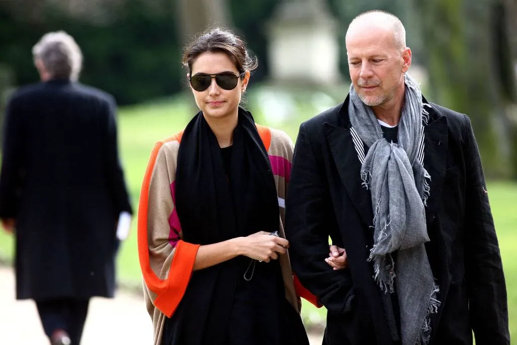 Actor Bruce Willis and his new girlfriend Emma Heming stroll in the Luxembourg gardens