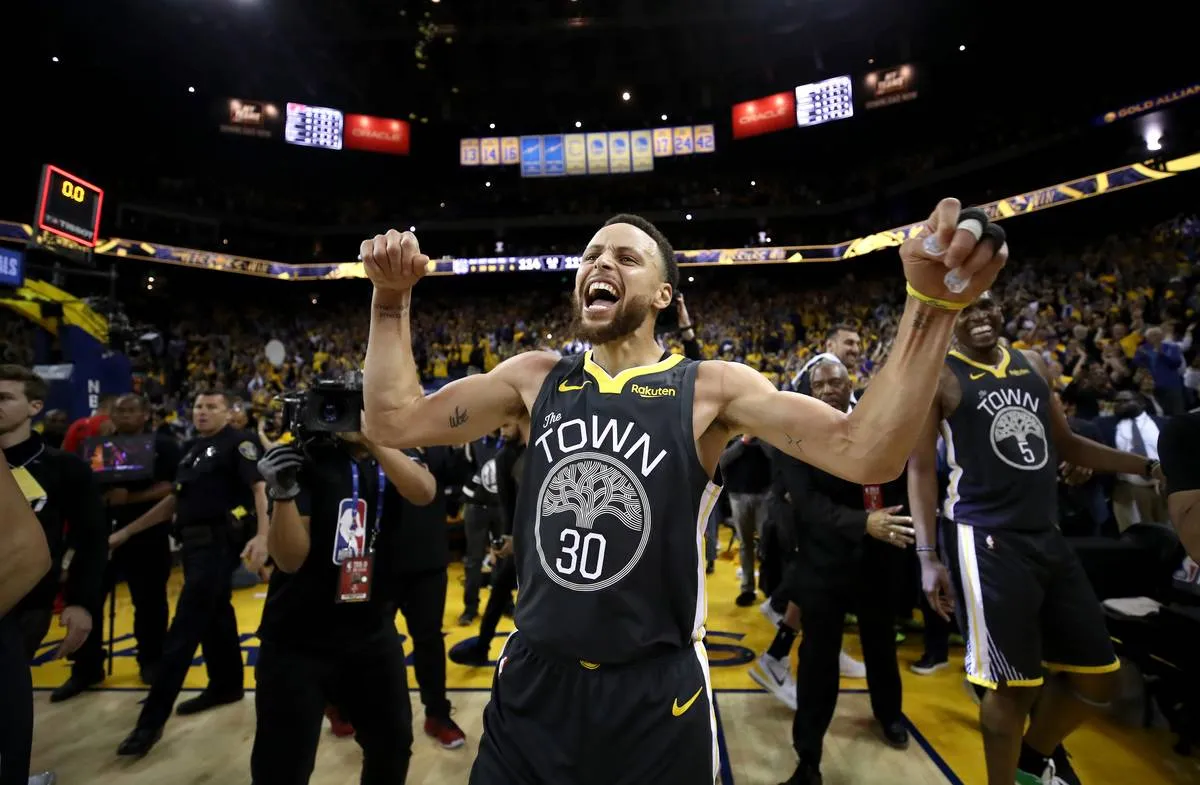 OAKLAND, CALIFORNIA - MAY 16: Stephen Curry #30 of the Golden State Warriors celebrates after defeating the Portland Trail Blazers 114-111 in game two of the NBA Western Conference Finals at ORACLE Arena on May 16, 2019 in Oakland, California. NOTE TO USER: User expressly acknowledges and agrees that, by downloading and or using this photograph, User is consenting to the terms and conditions of the Getty Images License Agreement. 