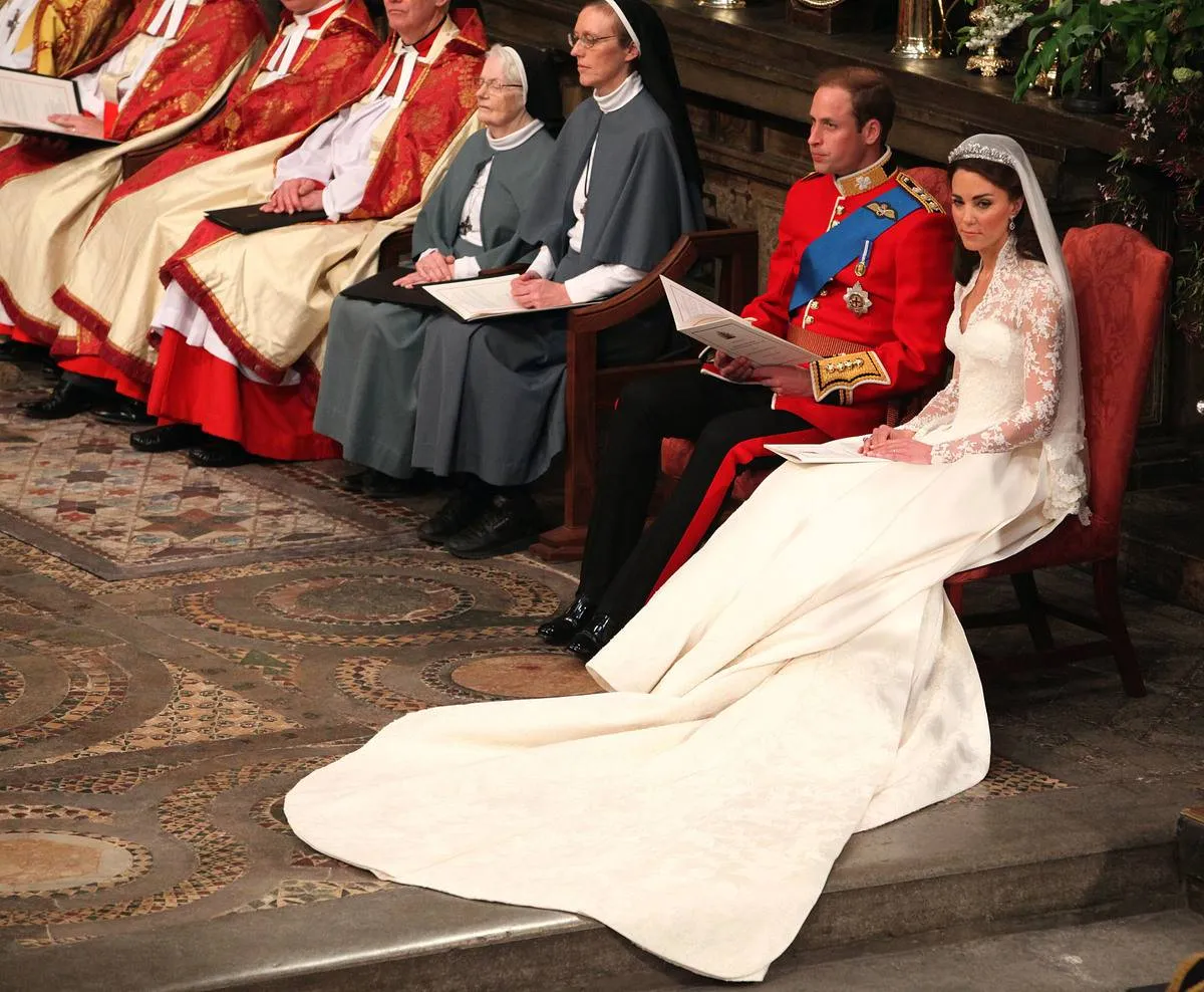LONDON, ENGLAND - APRIL 29: Prince William and Catherine Middleton during their wedding service in Westminster Abbey ahead of the Royal Wedding of Prince William to Catherine Middleton at Westminster Abbey on April 29, 2011 in London, England. The marriage of the second in line to the British throne is to be led by the Archbishop of Canterbury and will be attended by 1900 guests, including foreign Royal family members and heads of state. Thousands of well-wishers from around the world have also flocked to London to witness the spectacle and pageantry of the Royal Wedding.