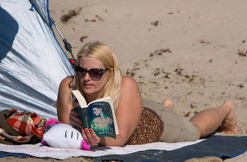 Woman reading a romance novel