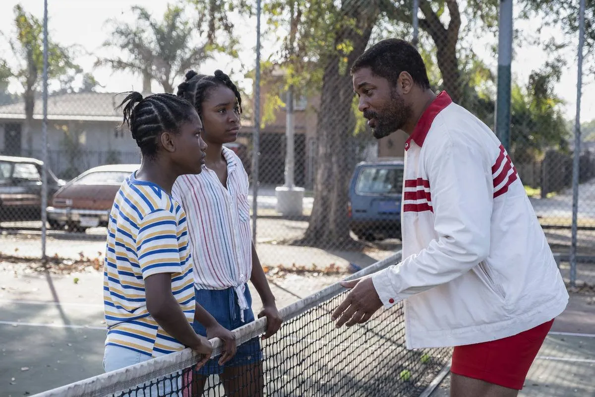will smith talking to two teens over a tennis court net