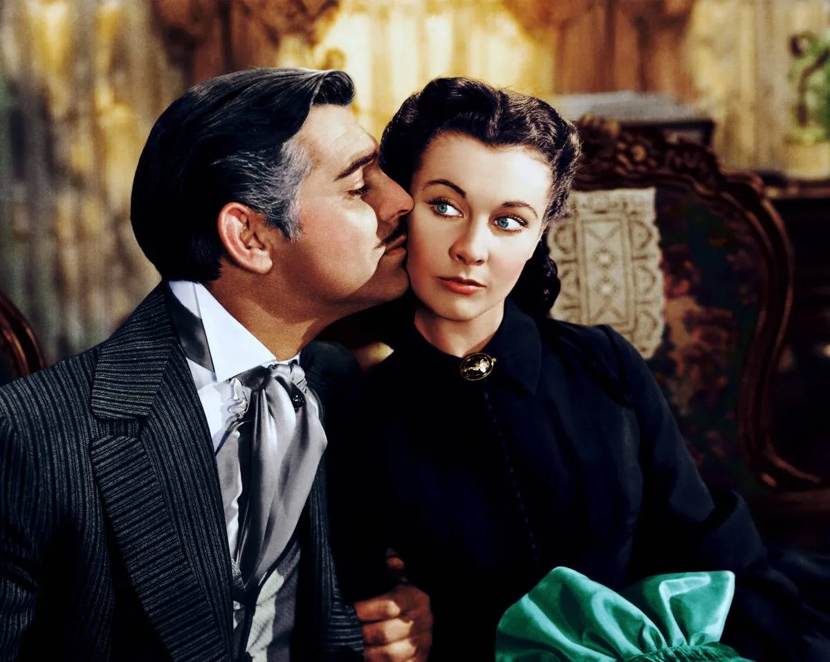 Clark Gable buryng his face in Vivien Leigh's cheek in Gone With The Wind